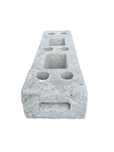 a side view of the concreteblock 35kg on a white bakcground